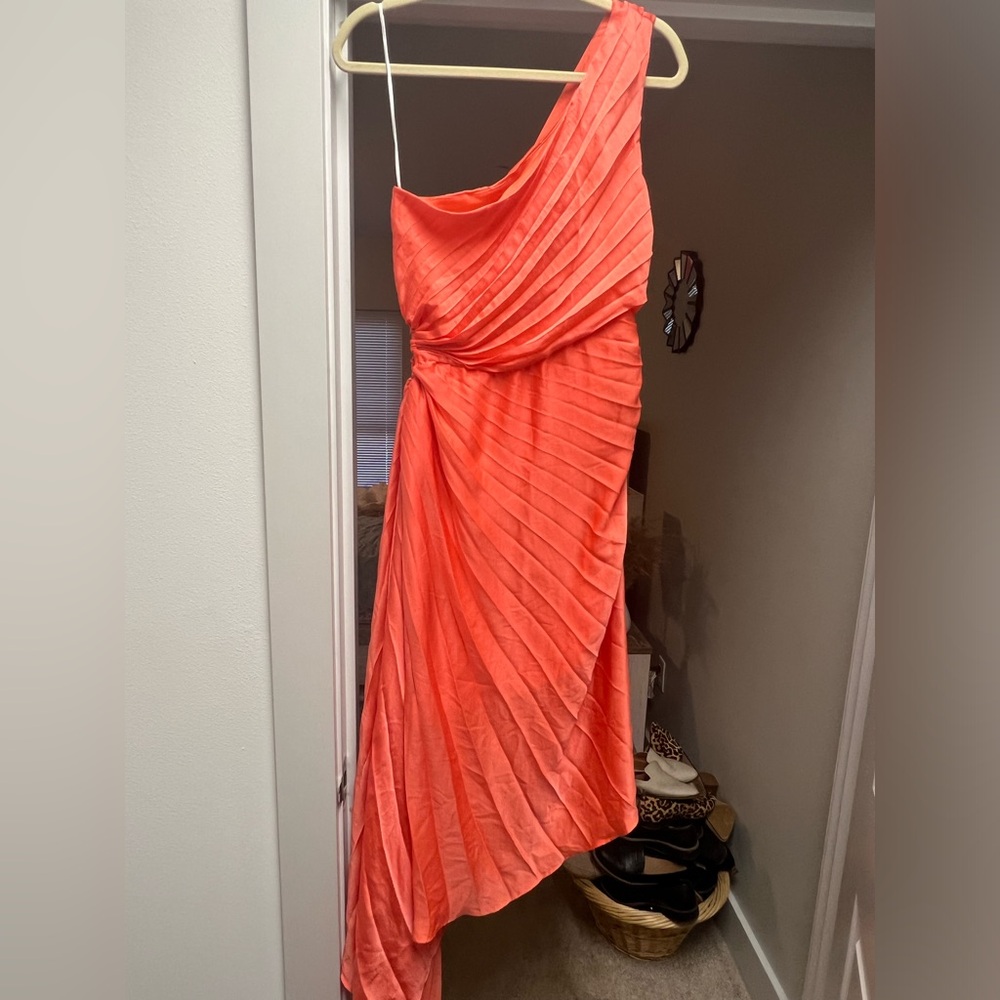 NWT Tangerine one shoulder asymmetrical dress. Size L. True to size. Lined.